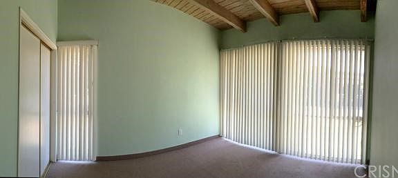 Beamed Ceiling and new paint in bedroom