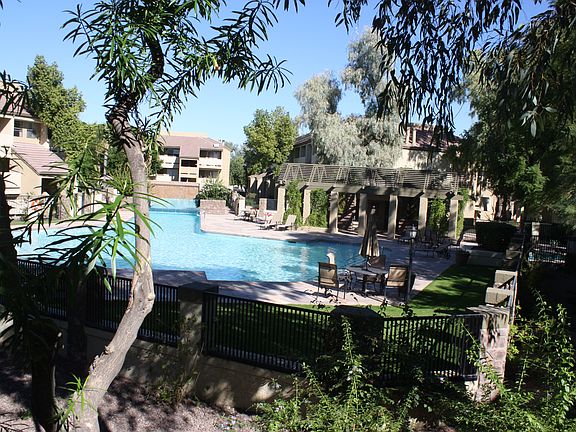 Lush pool view front balcony