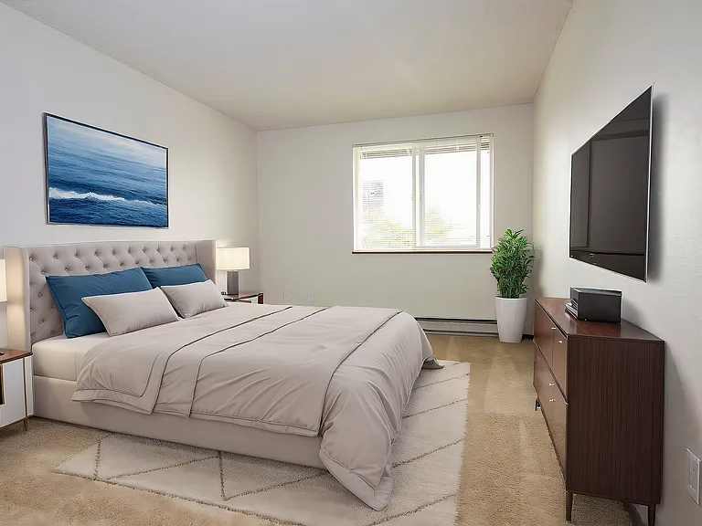 Step into tranquility with this serene and modern bedroom design.