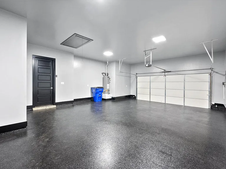 Fresh epoxied 3 car garage
