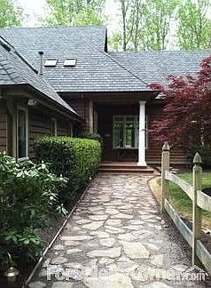 Front Door Entrance
						:
						Entrance via slate walkway with yard to your right