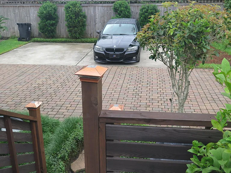 The resident will have their own dedicated parking space to the left of the back car.