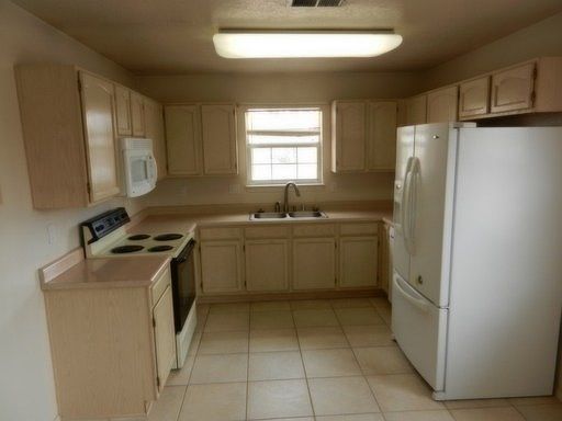 4th image of 1401 Desert Bloom Ave NW