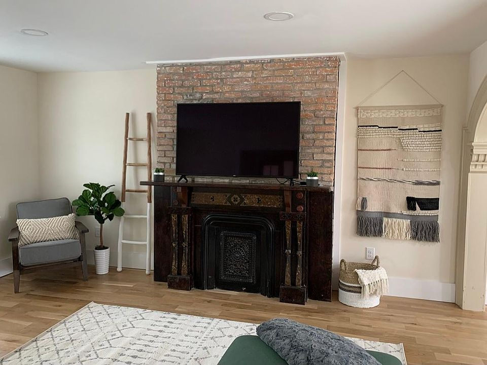 Living room, with decorative fireplace