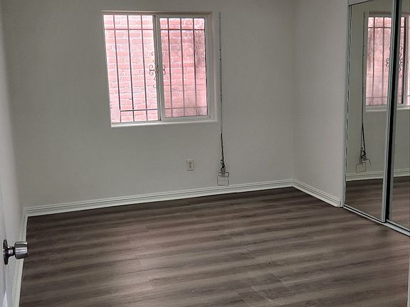 Room 1 - New Floor, New Door, New Light, New Closet door.