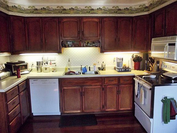 Kitchen view (before update) of lived in look