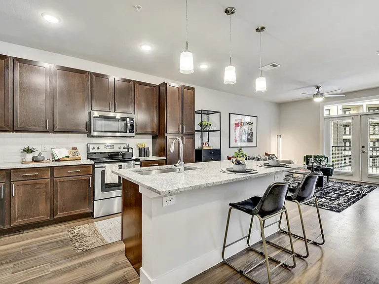 Two quartz countertop and kitchen cabinet colors to choose from.