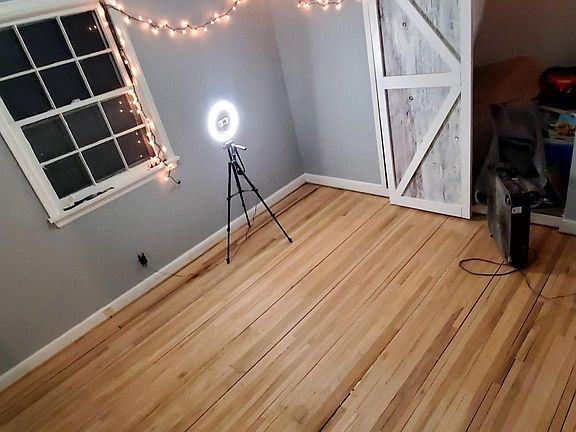 12 x 16 Bedroom with Custom Barndoors at closet.