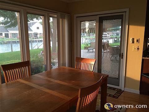 Garden seating area with sliding glass doors to patio