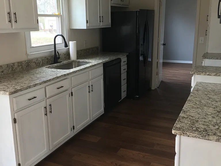Kitchen leading to formal dining room