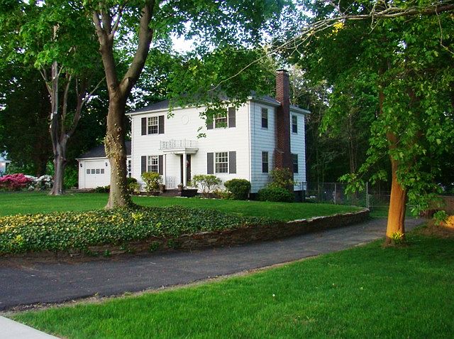 Exterior Front / 1 of 2 Driveways