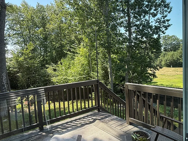 Second story deck. Overlooking field to the right.
