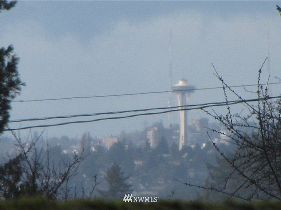 Admire Downtown Seattle skyline from your own deck.
