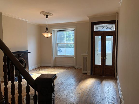 Living Room view from stair landing looking toward the front of the house.