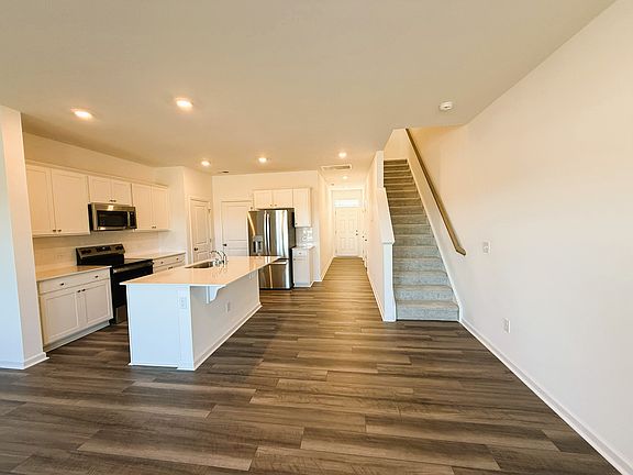 Great Room and Dining. Open-concept main floor