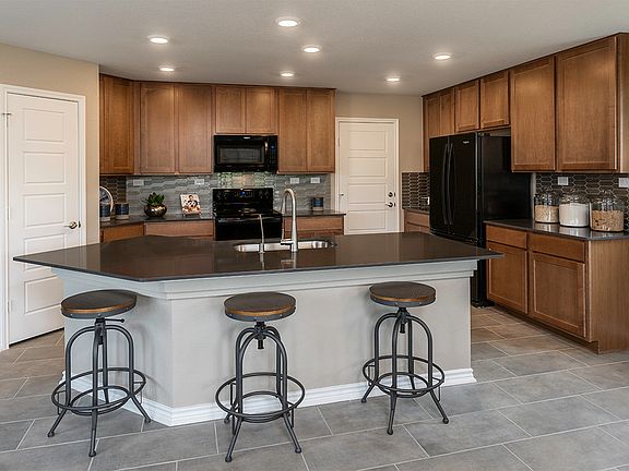 Plan 2411 Kitchen as modeled at Champions Landing