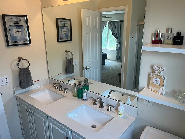 Owner's suite bathroom with dual sinks