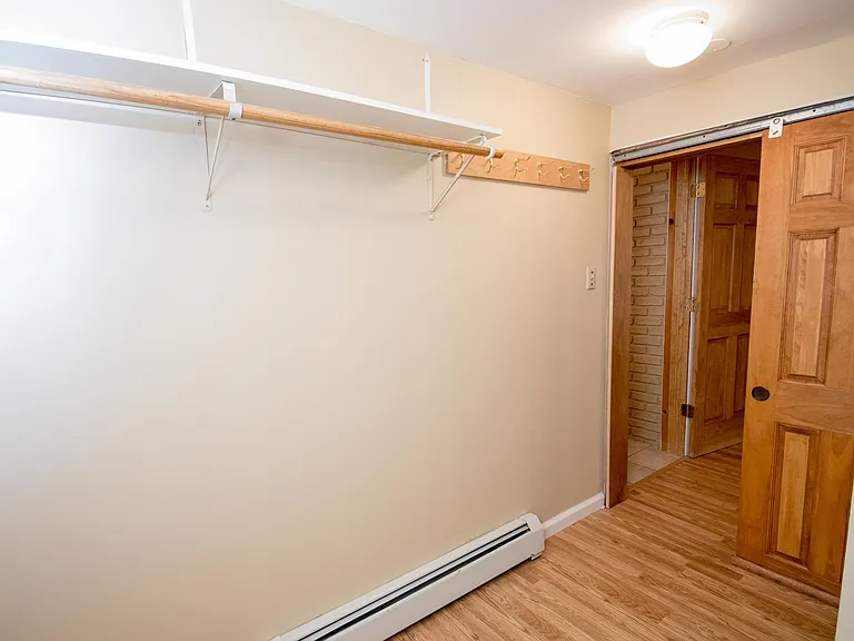 Large walk in closet in first floor bedroom