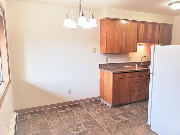 Spacious dinette facing east and courtyard view.
