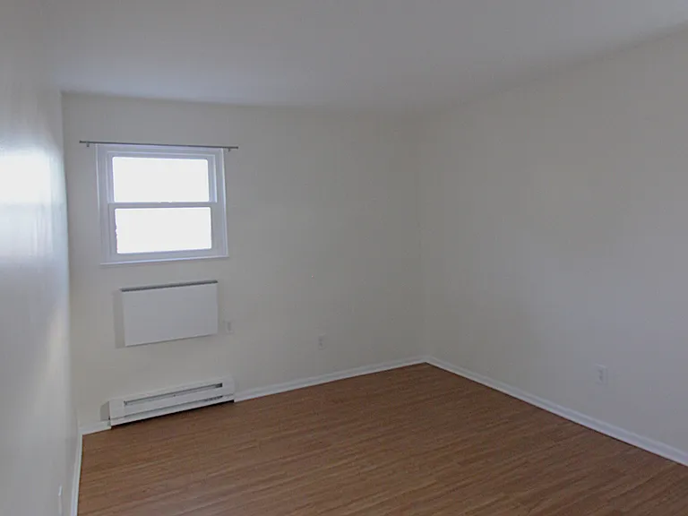 The larger bedroom