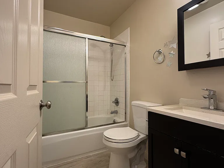 upstairs ensuite second bathroom/ downstairs ensuite bathroom is exact same layout and style