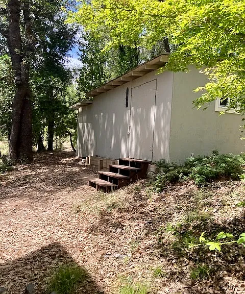 Shed with concrete floor and power.