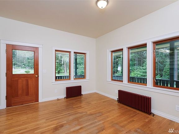 Entrance through front door into dining area.
