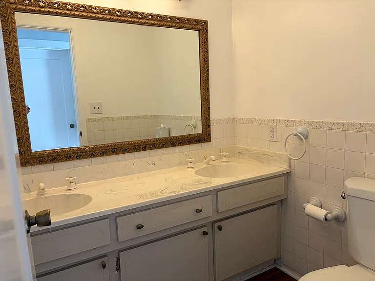 Half Bathroom with double sinks.