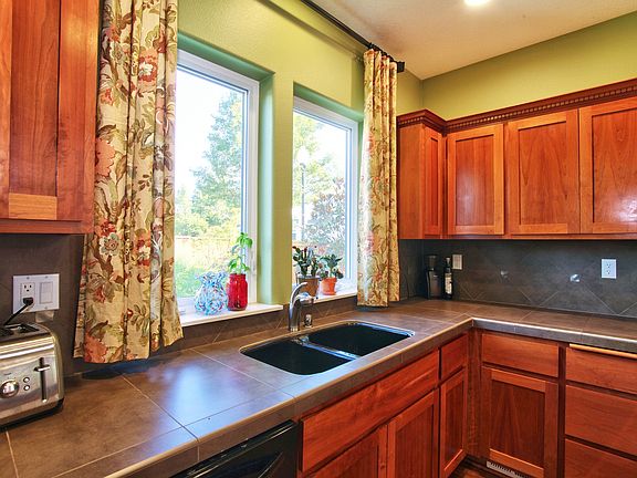 5th image of 5699 NE Vino Ct