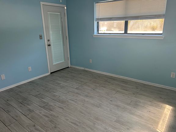 Master bedroom with door to porch
