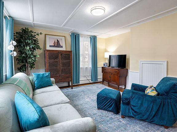 Living room on the first floor with a TV for streaming