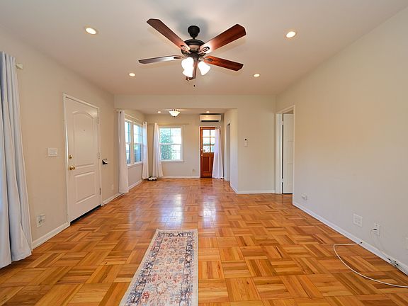fully upgraded and bright w/ parquet hardwood flooring + mini split hvac + in-unit laundry