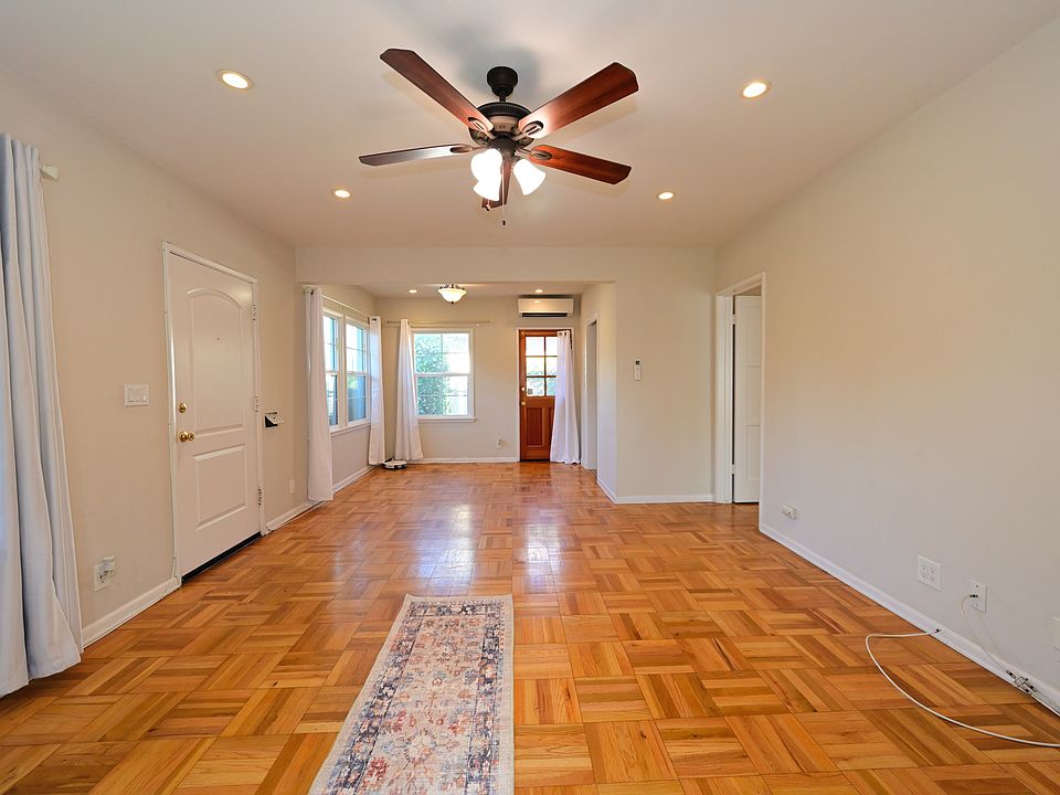 fully upgraded and bright w/ parquet hardwood flooring + mini split hvac + in-unit laundry