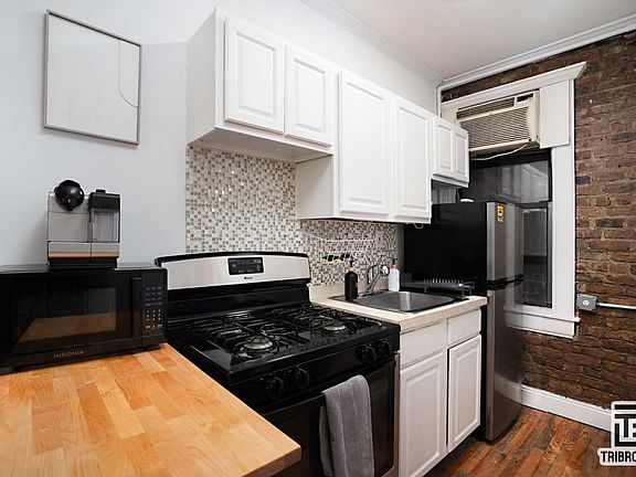 2nd image of 103 E 2nd St APT 5