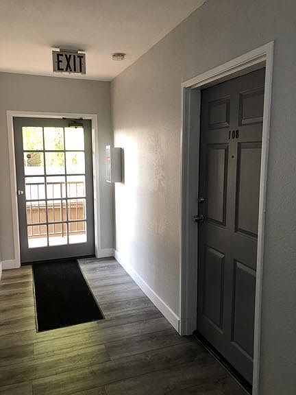 Unit Front door near exit at rear of building.