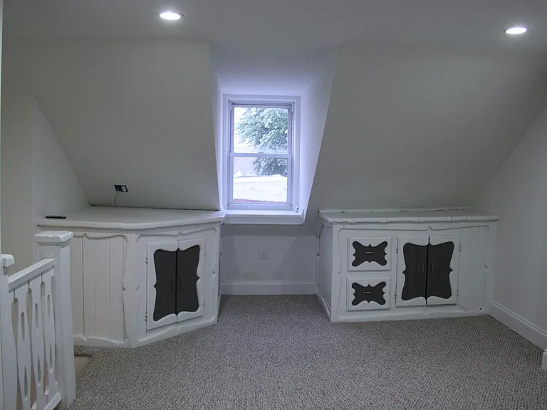 Unfurnished top floor bedroom.