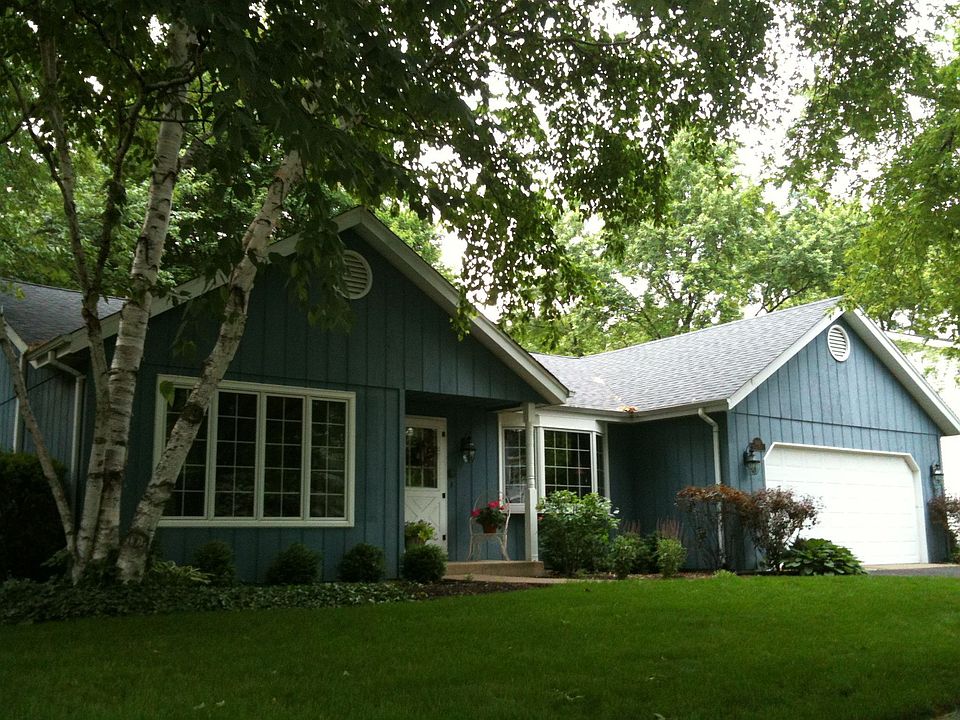 Front, showing living and dining rooms and white birch