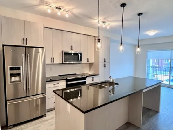 151 Legacy Main St N #8, Calgary, AB T2X 4A4