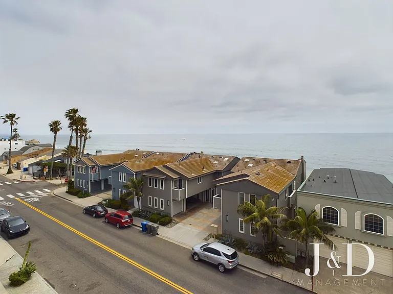 Newly Renovated Units Near the Beach with Parking — Photo 11