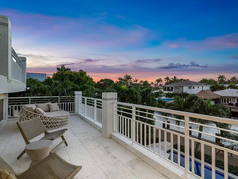 Savor breathtaking sunset views from the private balcony_a perfect spot to unwind as the day fades.