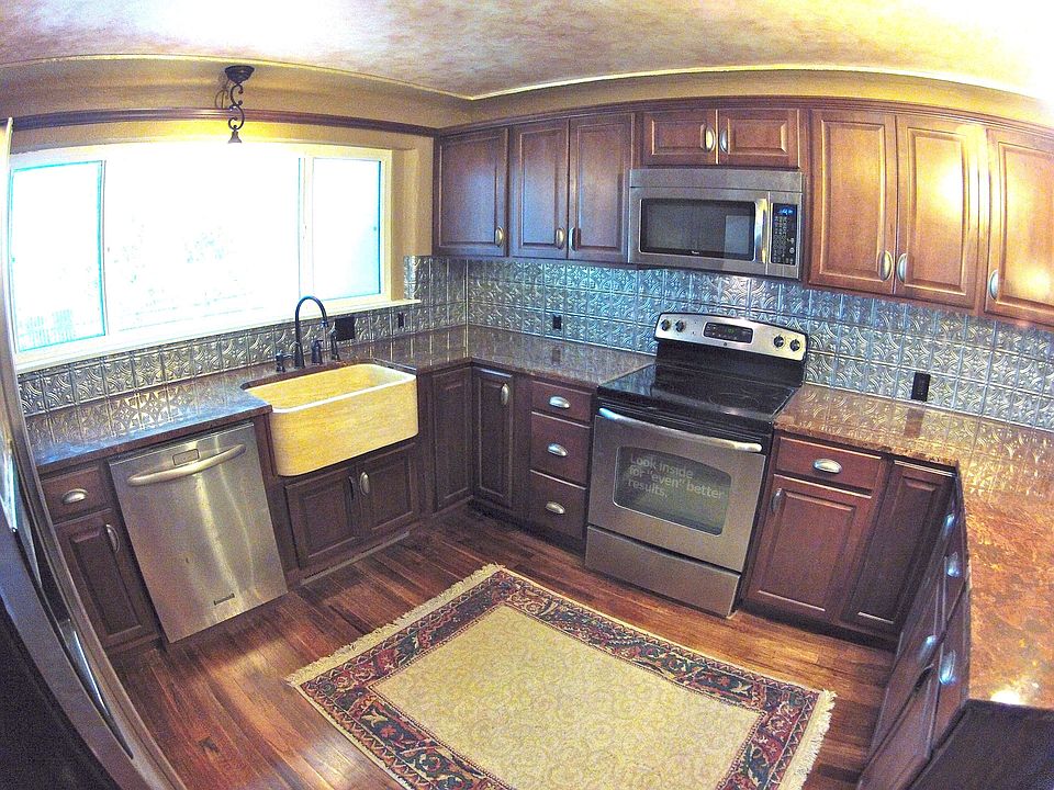 Moroccan granite and stainless kitchen