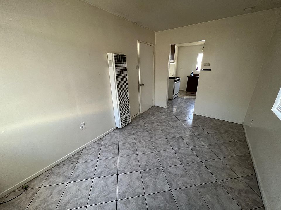 Living room facing kitchen view
