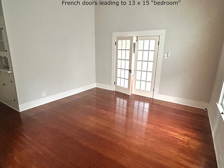 13 x 13 living room space with french doors leading to 13 x 15 bedroom