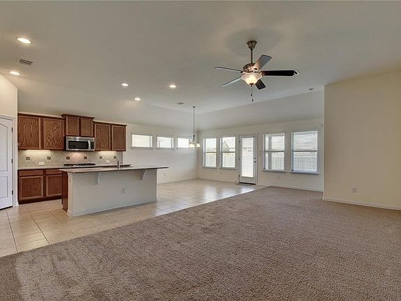 Open living room to kitchen