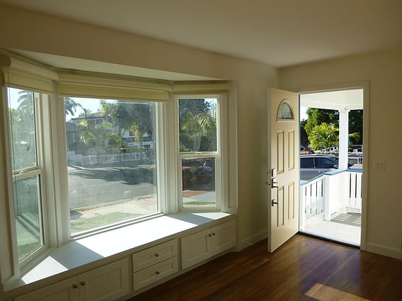 Living Room entry with bay window.
