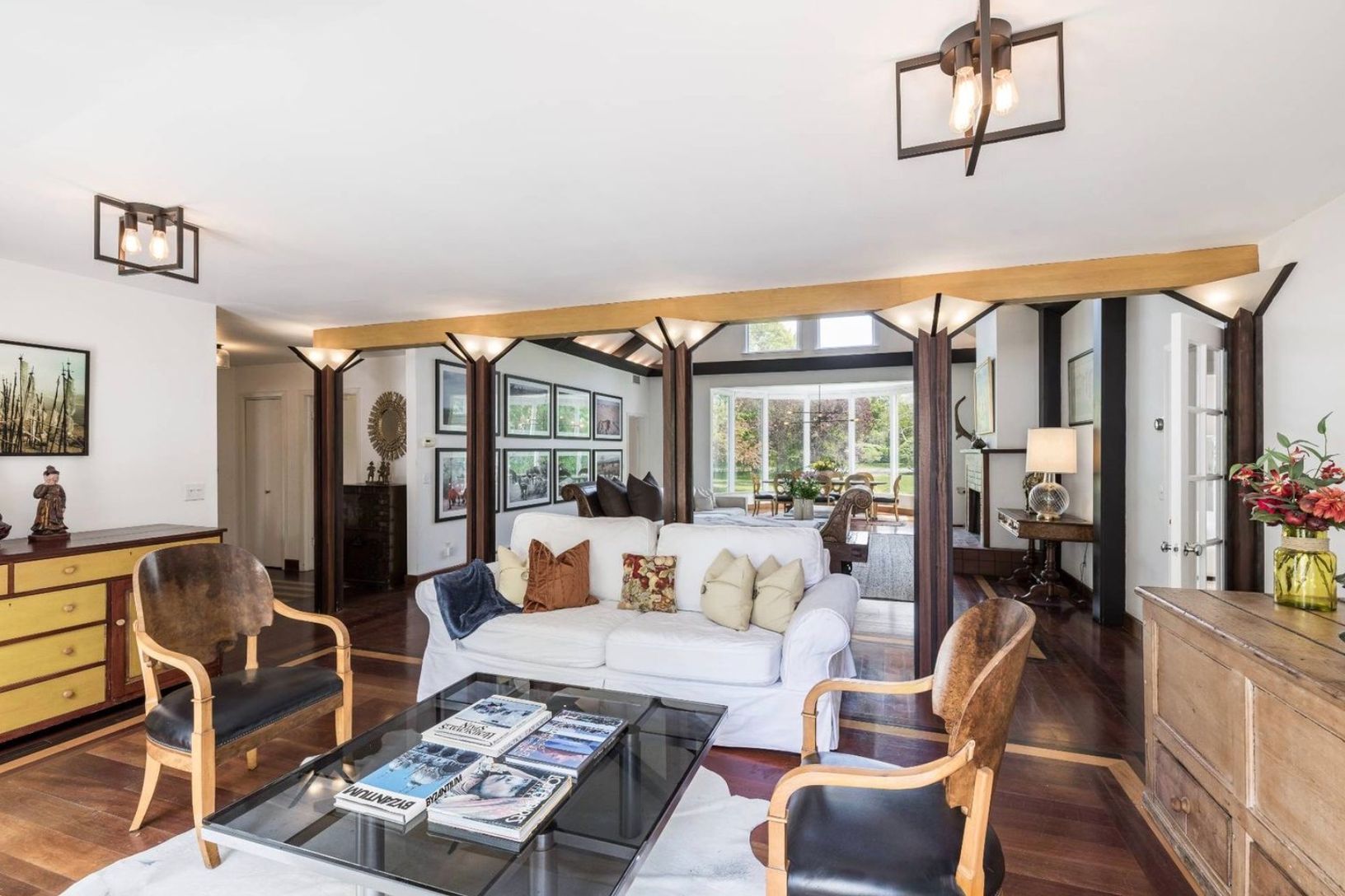  living room view from pool area patio doors, multiple seating areas available