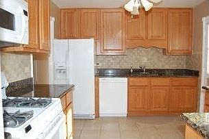 Kitchen Remodeled with Ceramic Floor & Walls w/ Granite Counter Tops