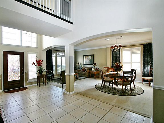 View into formal living and dining.