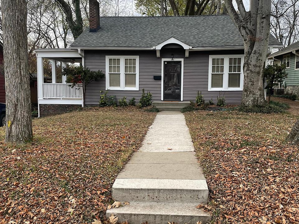 FRONT OF HOUSE/SIDE PORCH