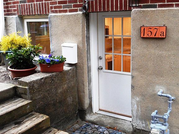 apartment door, steps to patio